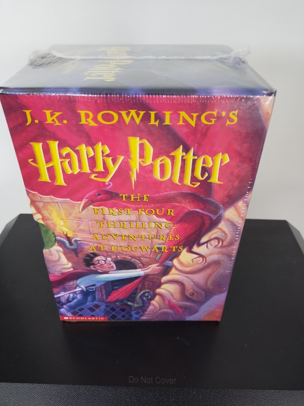 Harry Potter: The First Four Thrilling Adventures Box Set (Red/Yellow Cover)